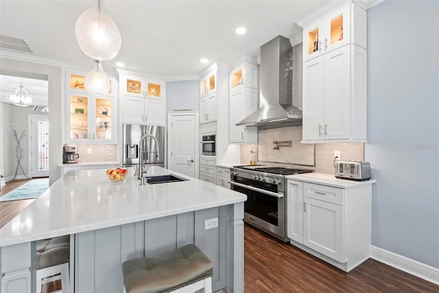 7 Menorca Way, Palm Coast, FL 32137 - kitchen with visible vents, decorative backsplash, wall chimney exhaust hood, a sink, and stainless steel appliances