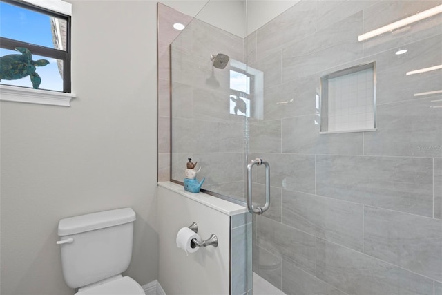 7 Menorca Way, Palm Coast, FL 32137 - bathroom featuring toilet and tiled shower
