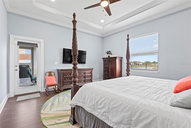 7 Menorca Way, Palm Coast, FL 32137 - bedroom with crown molding, baseboards, a tray ceiling, and wood finished floors