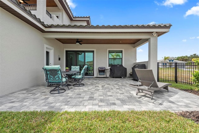 7 Menorca Way, Palm Coast, FL 32137 - view of patio / terrace featuring area for grilling, ceiling fan, and fence