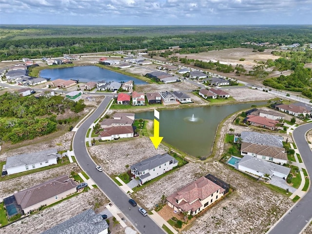 7 Menorca Way, Palm Coast, FL 32137 - drone / aerial view featuring a water view, a view of trees, and a residential view