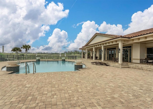 7 Menorca Way, Palm Coast, FL 32137 - view of pool with fence, a fenced in pool, and a patio area