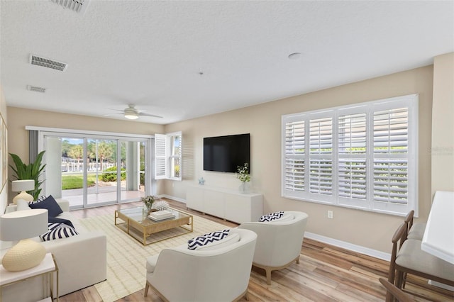 500 Canopy Walk Ln Unit 515, Palm Coast, FL 32137 - living room with wood finished floors and a ceiling fan