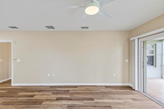 500 Canopy Walk Ln Unit 515, Palm Coast, FL 32137 - spare room with wood finished floors and a ceiling fan