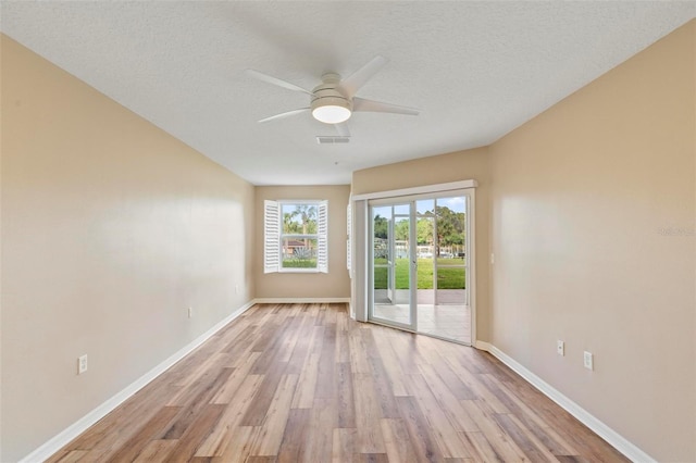 500 Canopy Walk Ln Unit 515, Palm Coast, FL 32137 - unfurnished room with light wood finished floors and a ceiling fan