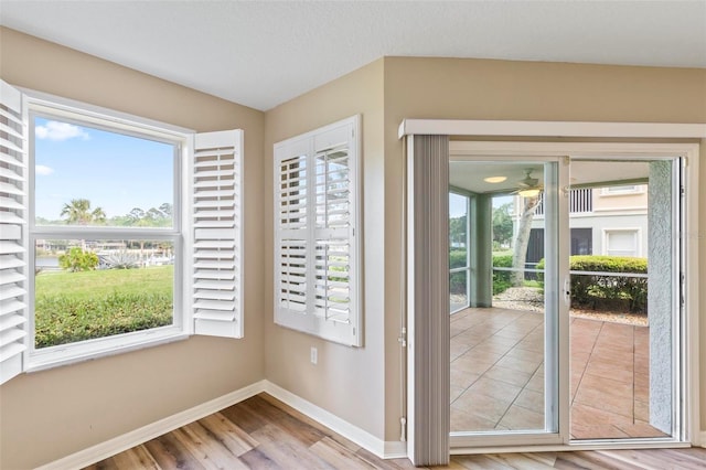 500 Canopy Walk Ln Unit 515, Palm Coast, FL 32137 - doorway with wood finished floors and a ceiling fan