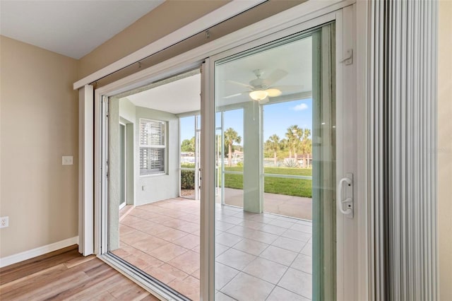 500 Canopy Walk Ln Unit 515, Palm Coast, FL 32137 - doorway with a ceiling fan and light wood-style floors