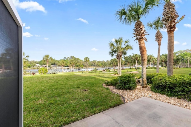 500 Canopy Walk Ln Unit 515, Palm Coast, FL 32137 - view of green lawn featuring a water view