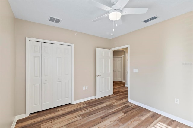 500 Canopy Walk Ln Unit 515, Palm Coast, FL 32137 - unfurnished bedroom with light wood finished floors, a closet, and a ceiling fan
