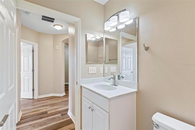500 Canopy Walk Ln Unit 515, Palm Coast, FL 32137 - bathroom featuring vanity and wood finished floors