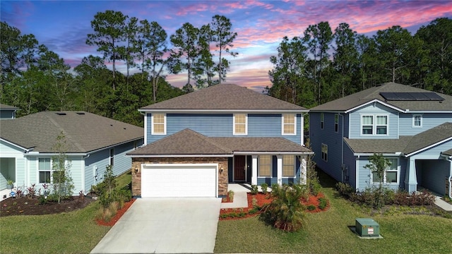 314 Red Barn Rd, Saint Augustine, FL 32092 - view of front of property with stone siding, an attached garage, concrete driveway, a front lawn, and roof with shingles