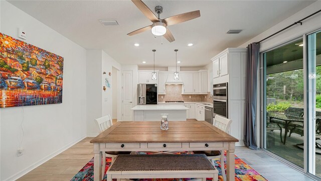 314 Red Barn Rd, Saint Augustine, FL 32092 - dining area featuring baseboards, visible vents, light wood-style floors, and ceiling fan