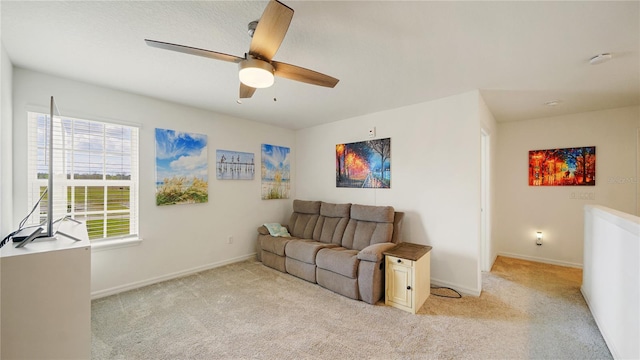 314 Red Barn Rd, Saint Augustine, FL 32092 - living room with light carpet, baseboards, and a ceiling fan