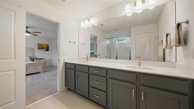 314 Red Barn Rd, Saint Augustine, FL 32092 - ensuite bathroom with a ceiling fan, a sink, double vanity, and a stall shower
