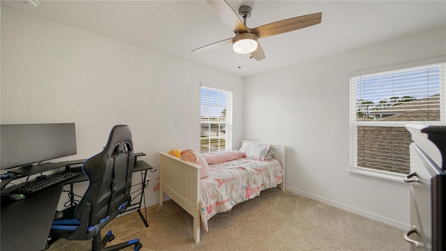 314 Red Barn Rd, Saint Augustine, FL 32092 - carpeted bedroom with multiple windows, baseboards, and a ceiling fan