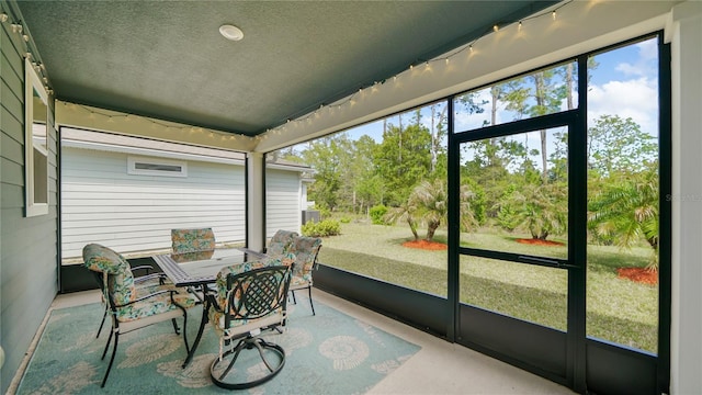 314 Red Barn Rd, Saint Augustine, FL 32092 - sunroom featuring outdoor dining space