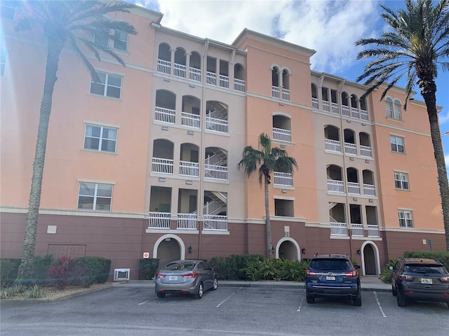 15 Ocean Crest Way Unit 1335, Palm Coast, FL 32137 - view of building exterior with uncovered parking