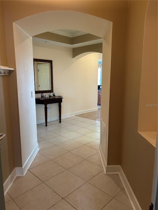 15 Ocean Crest Way Unit 1335, Palm Coast, FL 32137 - hallway with arched walkways, visible vents, baseboards, and light tile patterned floors