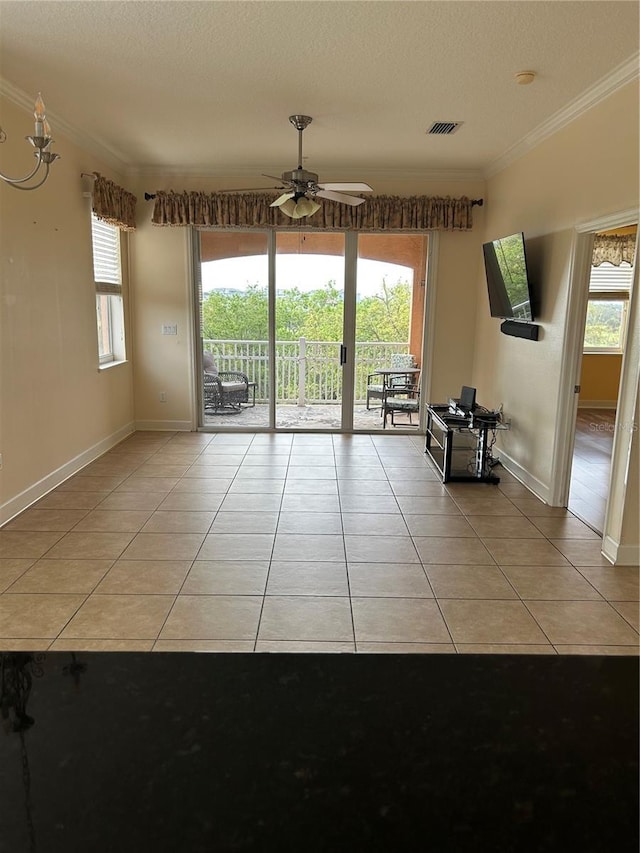 15 Ocean Crest Way Unit 1335, Palm Coast, FL 32137 - unfurnished living room featuring light tile patterned floors, ornamental molding, baseboards, ceiling fan, and visible vents
