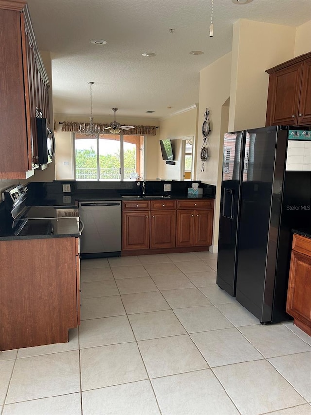 15 Ocean Crest Way Unit 1335, Palm Coast, FL 32137 - kitchen featuring light tile patterned floors, a sink, dark countertops, ceiling fan, and black appliances