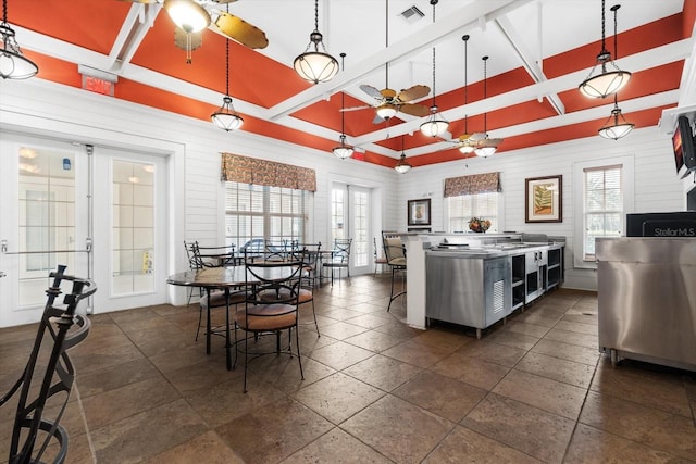 45 Riverview Bnd S Unit 1926, Palm Coast, FL 32137 - kitchen with a ceiling fan, french doors, a towering ceiling, and decorative light fixtures