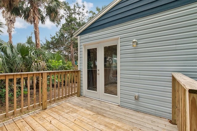 wooden deck featuring french doors