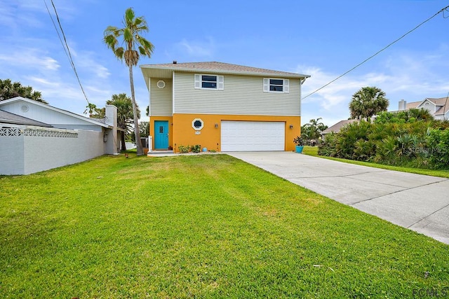 1951 N Daytona Ave, Flagler Beach, FL 32136 - view of front facade with a garage, concrete driveway, and a front yard