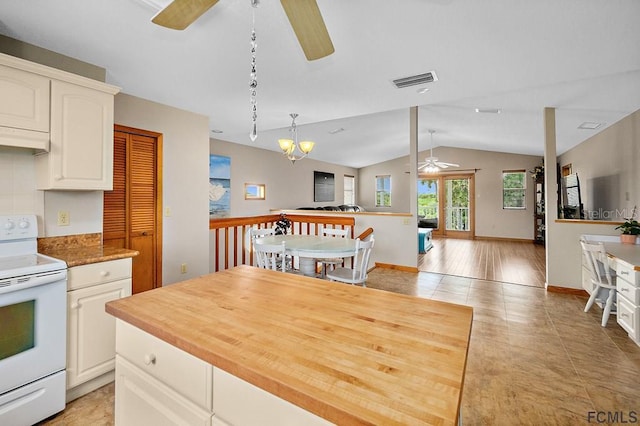 1951 N Daytona Ave, Flagler Beach, FL 32136 - kitchen featuring open floor plan, vaulted ceiling, ceiling fan with notable chandelier, electric range, and visible vents