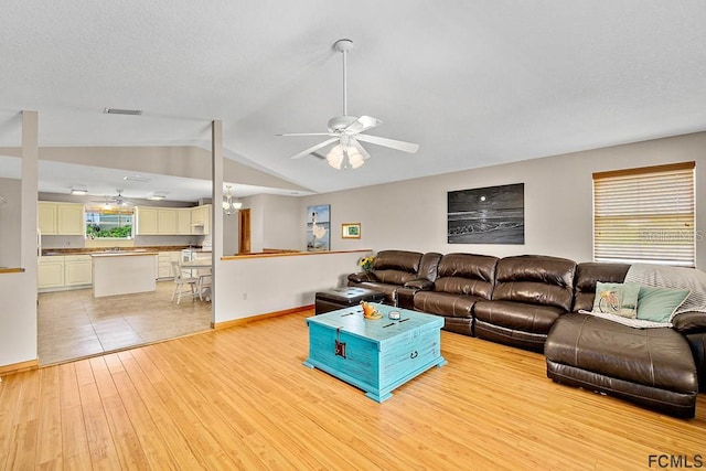 1951 N Daytona Ave, Flagler Beach, FL 32136 - living area featuring light wood finished floors, a wealth of natural light, and ceiling fan
