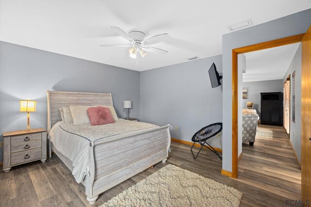 1951 N Daytona Ave, Flagler Beach, FL 32136 - bedroom with attic access, wood finished floors, baseboards, visible vents, and ceiling fan