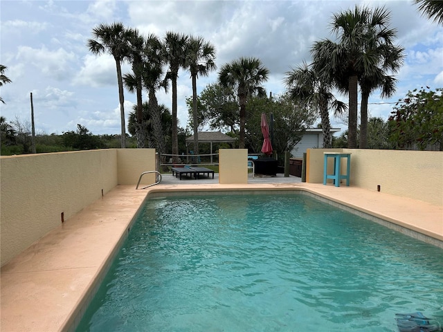 1951 N Daytona Ave, Flagler Beach, FL 32136 - view of pool featuring fence, a patio area, and a fenced in pool