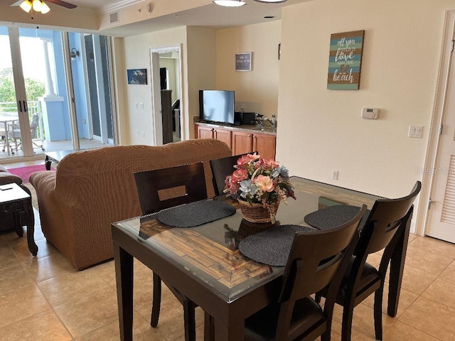 102 Yacht Harbor Dr Unit 375, Palm Coast, FL 32137 - dining area with ceiling fan, visible vents, and light tile patterned floors