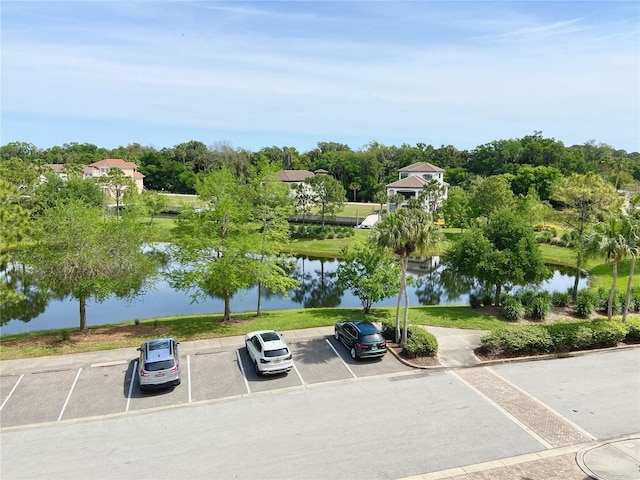 102 Yacht Harbor Dr Unit 375, Palm Coast, FL 32137 - uncovered parking lot with a water view