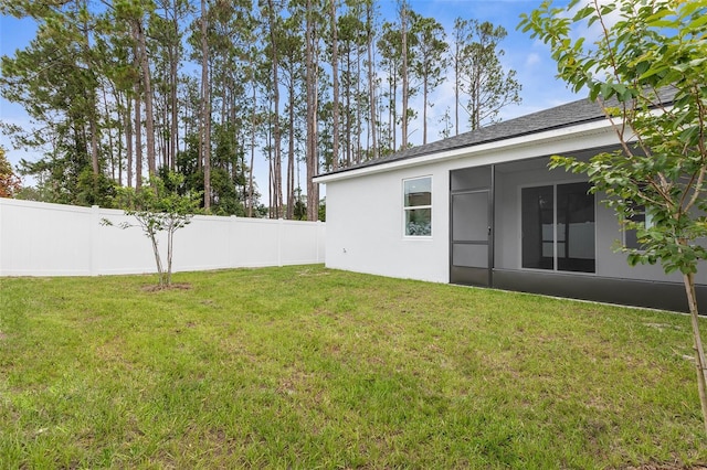 6 Rainbow Ln, Palm Coast, FL 32164 - view of yard with a sunroom