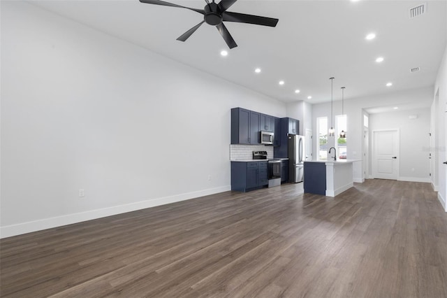 6 Rainbow Ln, Palm Coast, FL 32164 - unfurnished living room with recessed lighting, ceiling fan, and dark wood-style floors