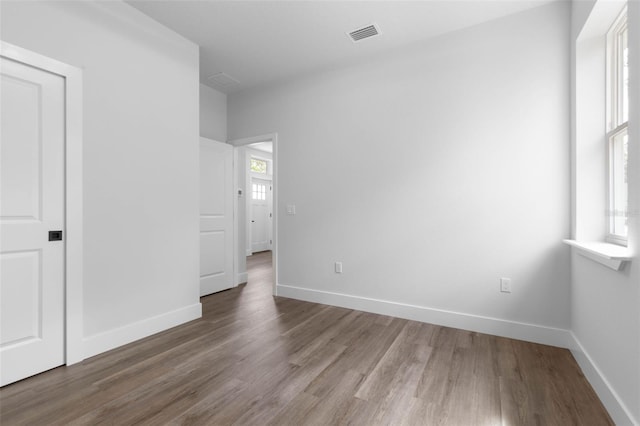6 Rainbow Ln, Palm Coast, FL 32164 - spare room with wood finished floors
