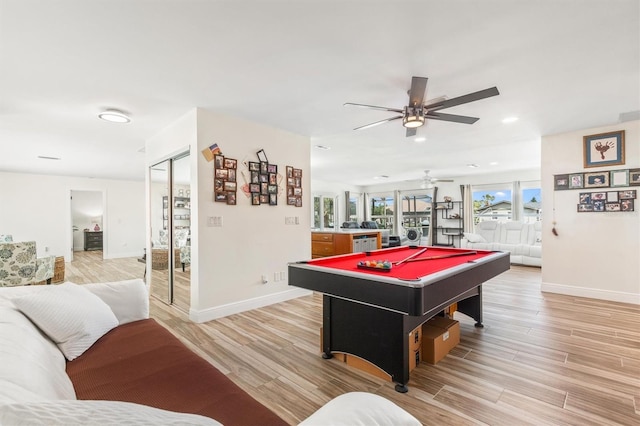 recreation room featuring baseboards, billiards, light wood-style flooring, and ceiling fan
