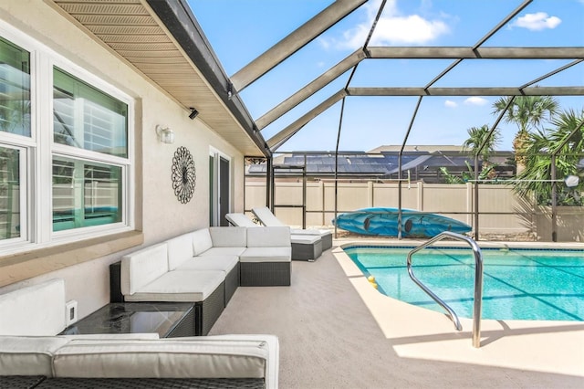 view of swimming pool featuring an outdoor hangout area, a lanai, a patio area, and a fenced in pool