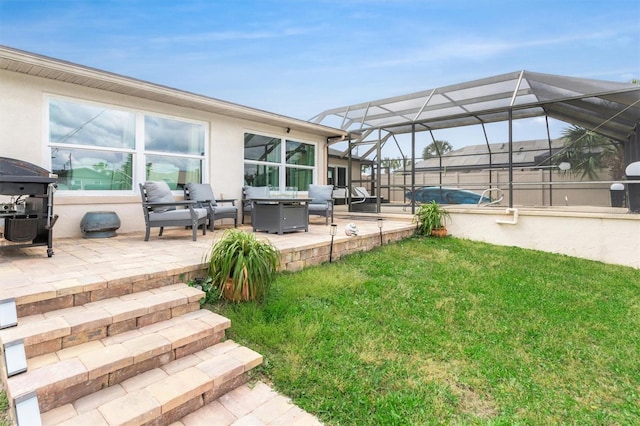view of yard featuring glass enclosure and a patio