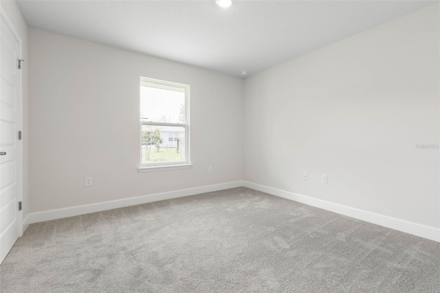 12 Squanto Pl, Palm Coast, FL 32164 - spare room featuring carpet, baseboards, and recessed lighting