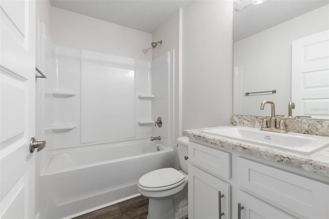 12 Squanto Pl, Palm Coast, FL 32164 - bathroom with vanity, toilet, tub / shower combination, and wood finished floors
