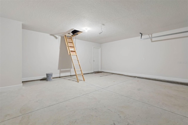 12 Squanto Pl, Palm Coast, FL 32164 - garage with baseboards
