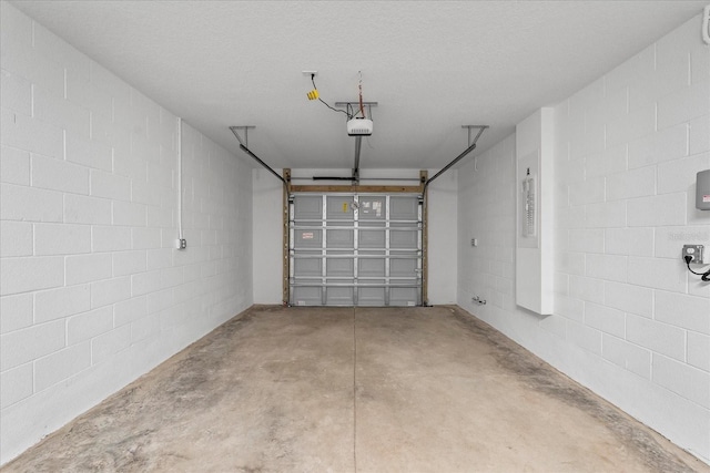 31 Secretary Trl, Palm Coast, FL 32164 - garage with a garage door opener and concrete block wall