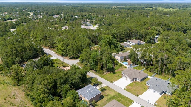 31 Secretary Trl, Palm Coast, FL 32164 - aerial view with a wooded view and a residential view