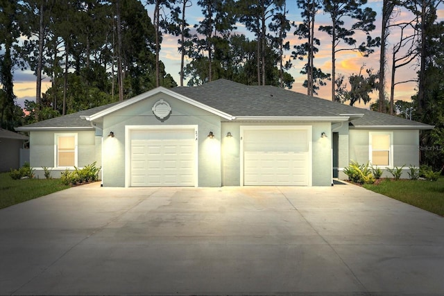 31 Secretary Trl, Palm Coast, FL 32164 - ranch-style house with stucco siding, a shingled roof, a garage, and concrete driveway