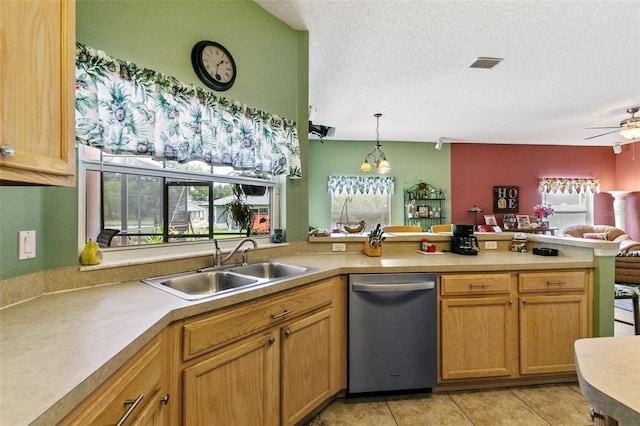 42 Buffalo Bill Dr, Palm Coast, FL 32137 - kitchen with visible vents, dishwasher, a sink, open floor plan, and a textured ceiling