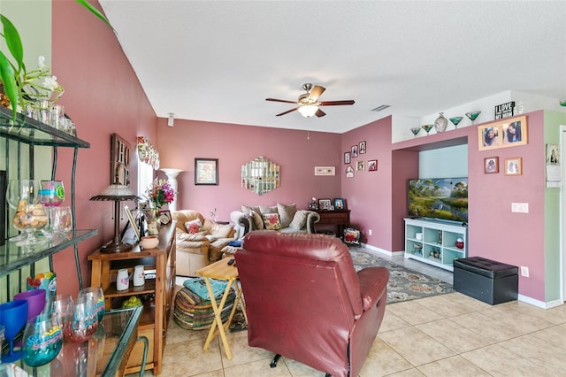 42 Buffalo Bill Dr, Palm Coast, FL 32137 - tiled living room with visible vents, baseboards, and a ceiling fan
