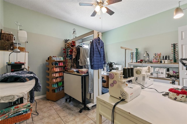 42 Buffalo Bill Dr, Palm Coast, FL 32137 - bedroom featuring light tile patterned floors, a ceiling fan, and a textured ceiling