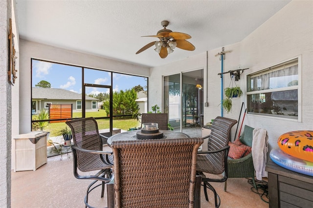 42 Buffalo Bill Dr, Palm Coast, FL 32137 - sunroom / solarium with a ceiling fan