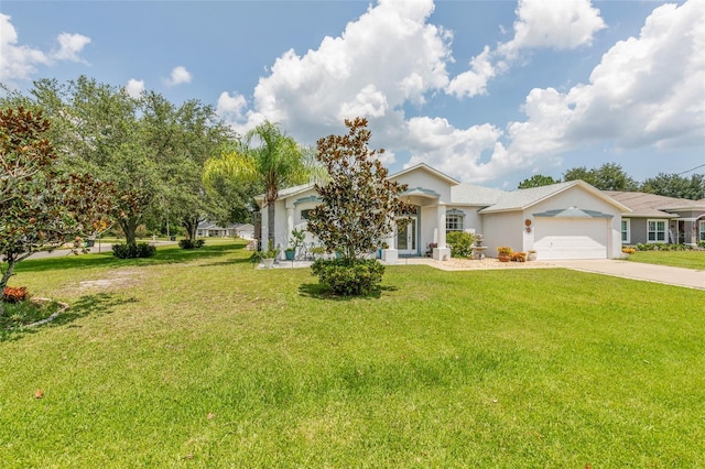 42 Buffalo Bill Dr, Palm Coast, FL 32137 - view of front of home with an attached garage, concrete driveway, stucco siding, and a front lawn